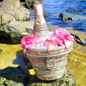 Mary frances champagne on ice bag